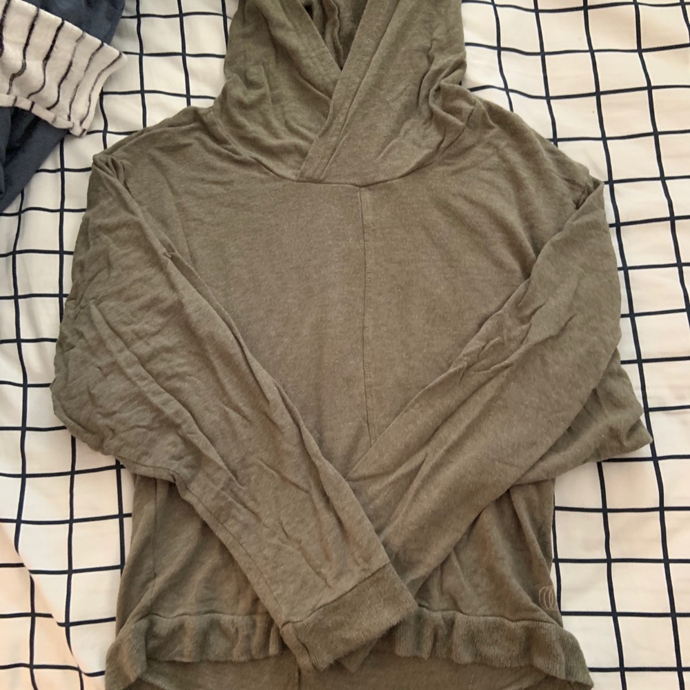 Hunter green activewear hoodie with ribbed bottom